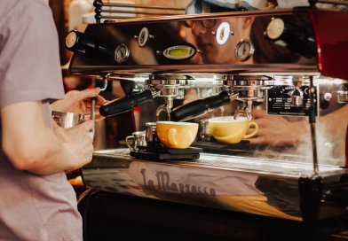 person using espresso machine